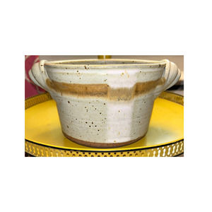 Handmade pottery bowl with side handles